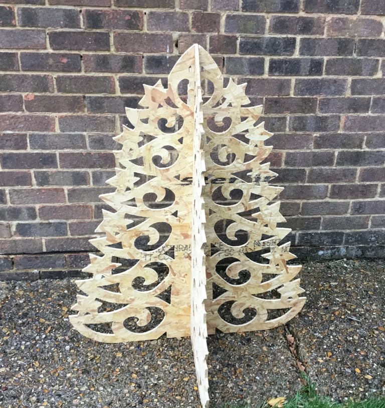 image for Laser cut Christmas Tree, made from Stirling board, measures 1.1m high x 1m wide at base.