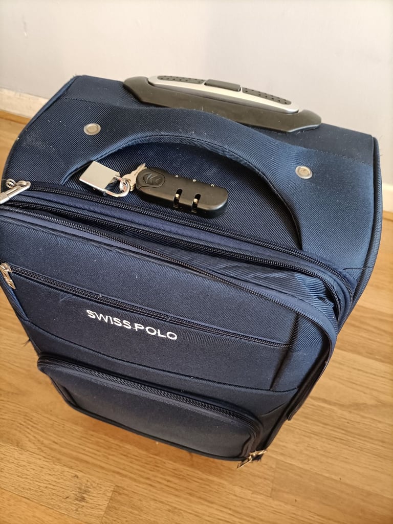 Suiss Polo Cabin luggage suitcase. Used once. 52cm x 34cm x 25cm. Dark blue. Includes new padlock 
