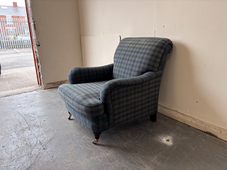 Marks and Spencer classic club chair with brass castors ! 