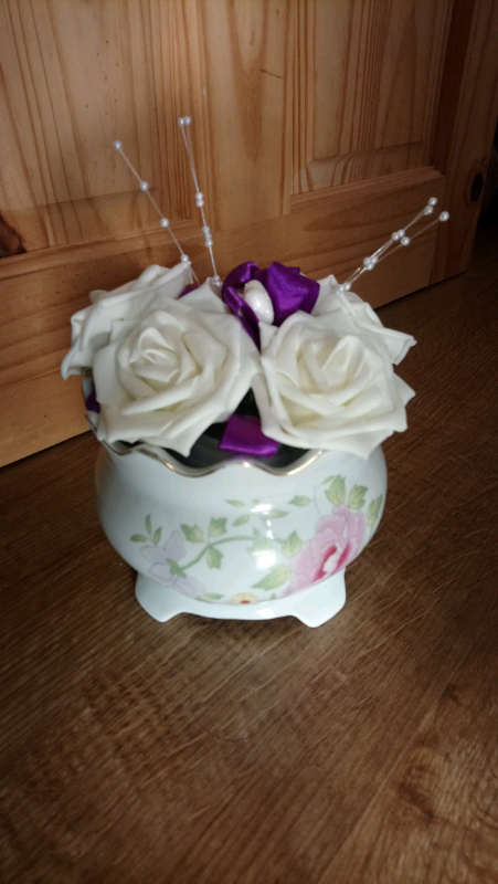Vintage Pottery Vase with artifical flowers 
