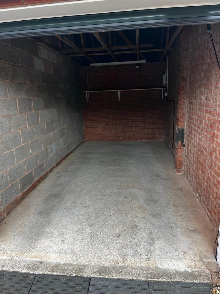 Electric included. Large garage with driveway and roof space.