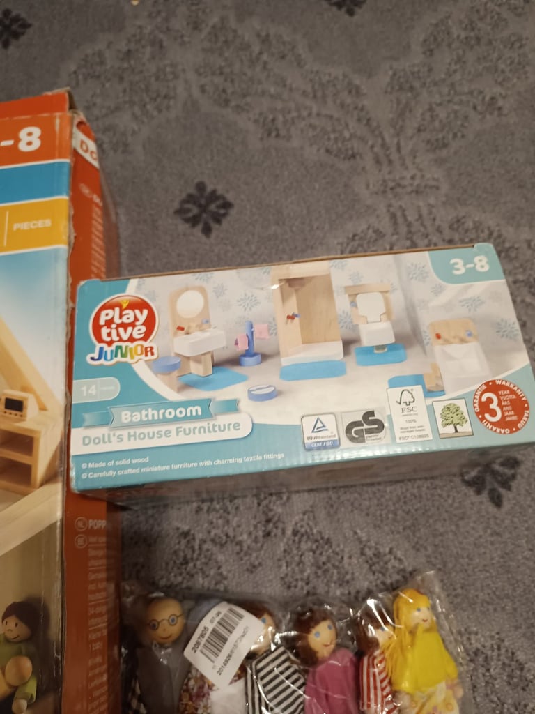 Brand new wooden doll house with furniture and dolls 