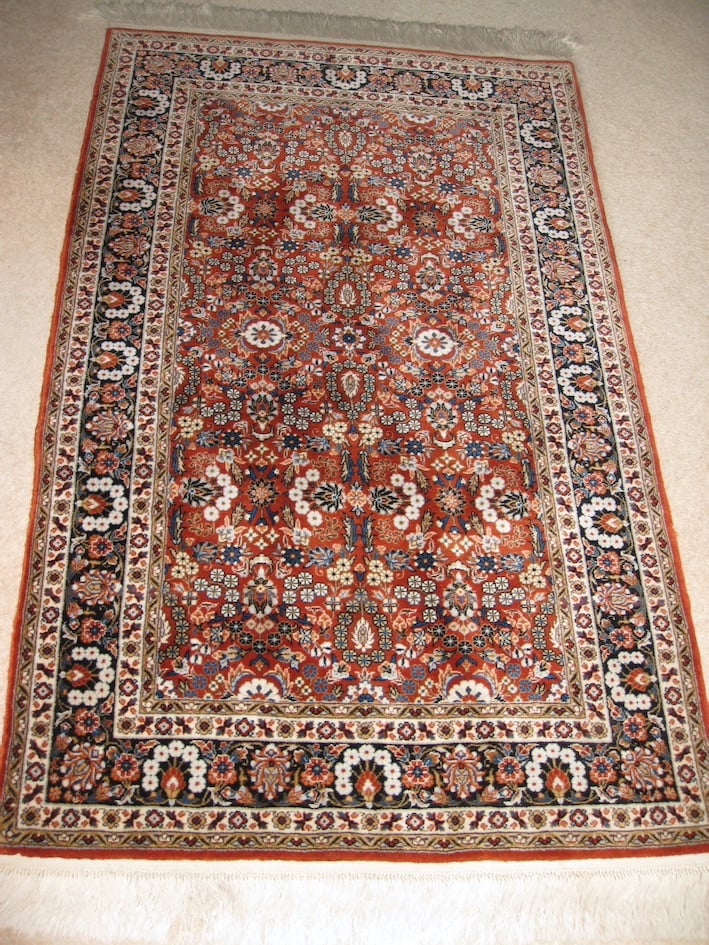 Hand-made 100% Wool Iranian rug, rust colour