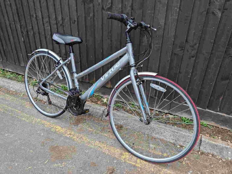 image for Apollo Virtue Hybrid Sport bike in good condition with mudguards and bell.