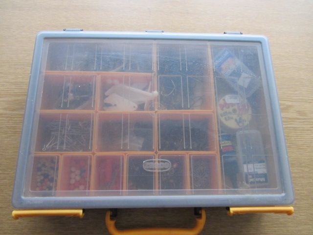 Large Assortment of sea fishing tackle in organiser box