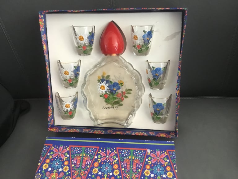 Vintage shot glasses and decanter