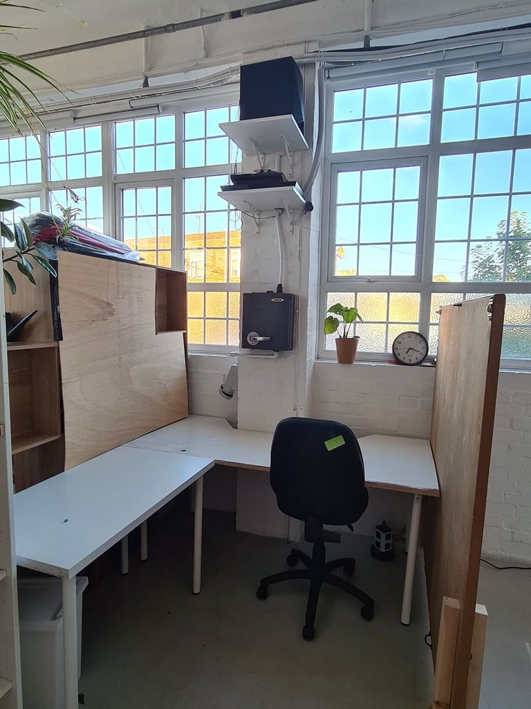 Deskspace in shared artist co-working space