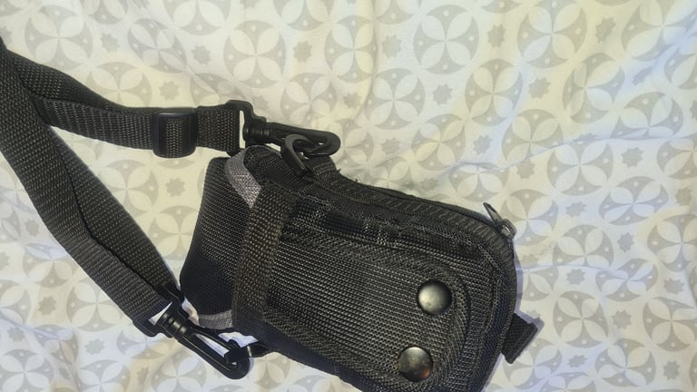 Camera bag/ case with shoulder strap. Multiple compartments. Excellent quality and condition.