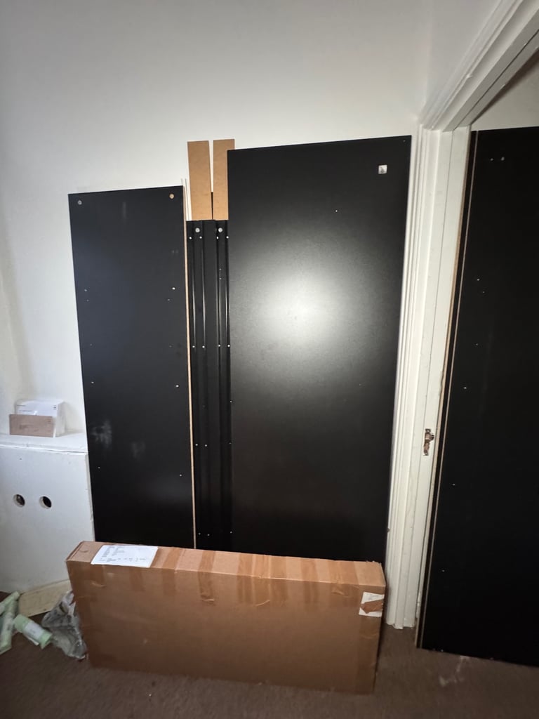 Modern Black Sliding Wardrobe – Brand New, Never Used (Minor Defect, Big Bargain!)