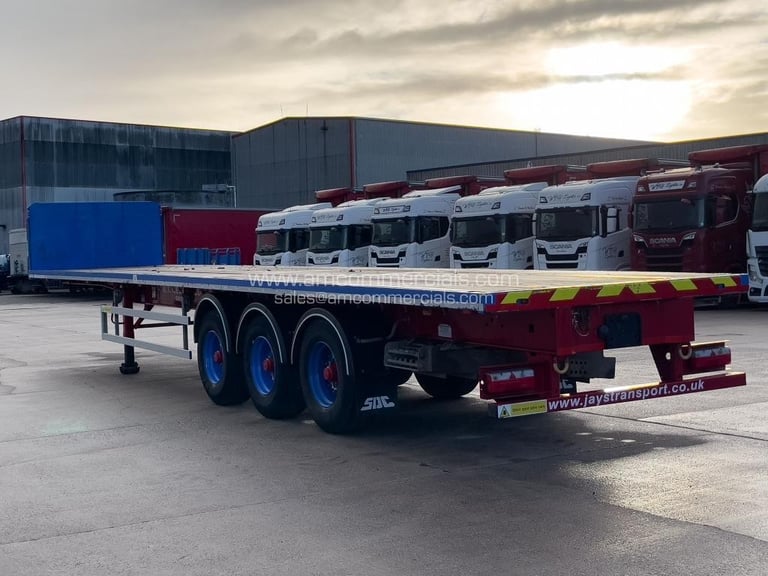 SDC TRI AXLE FLAT BED TRAILER 