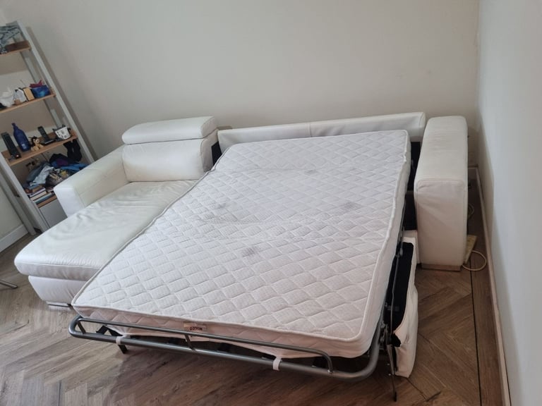 L SHAPE SOFA BED IN LEATHER