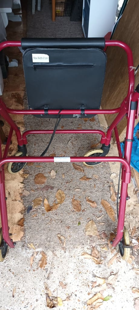Walking aid with seat