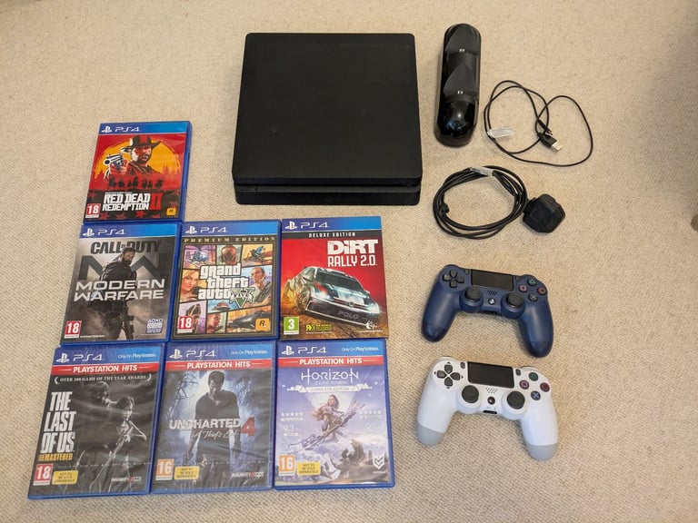 PS4 Slim Bundle, 2 controller, 7 games, charging dock.