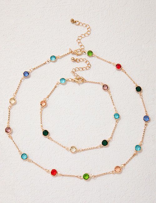 image for Gold necklace and bracelet set embellished with multi-coloured stones
