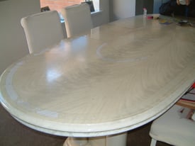 Large dining table + 6 chairs.