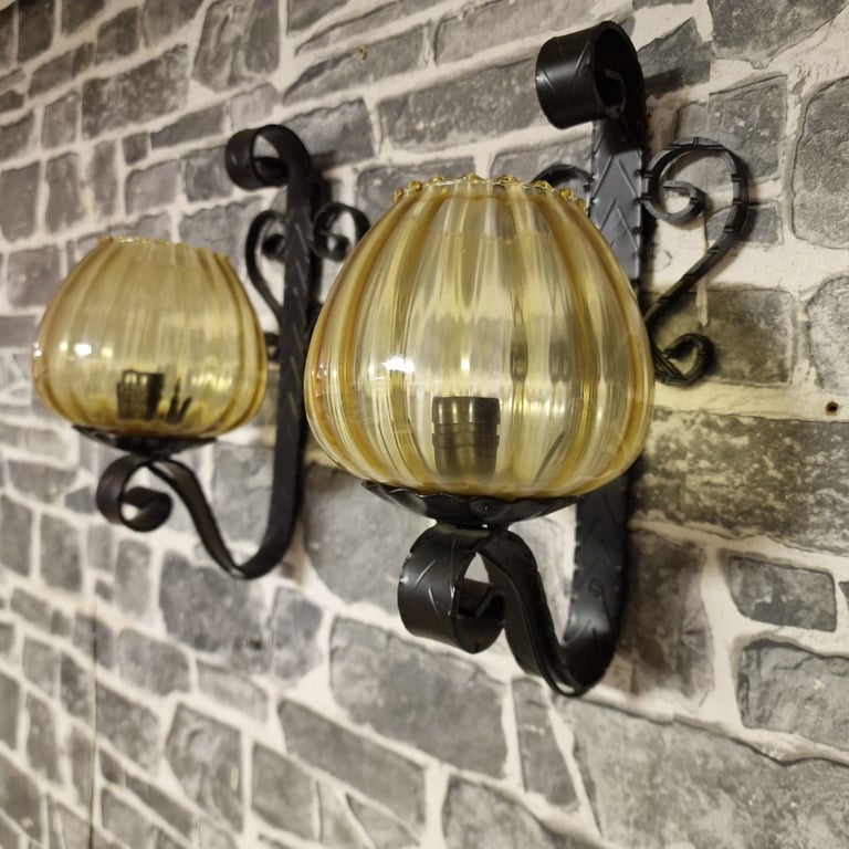 Pair of Vintage Wrought Iron Wall Sconces with Amber Glass Shades