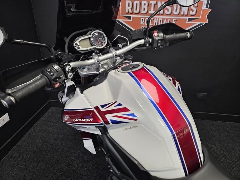 2013 Triumph Tiger Explorer 1215 in white with luggage.