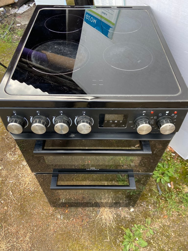 image for New world freestanding ceramic top electric oven