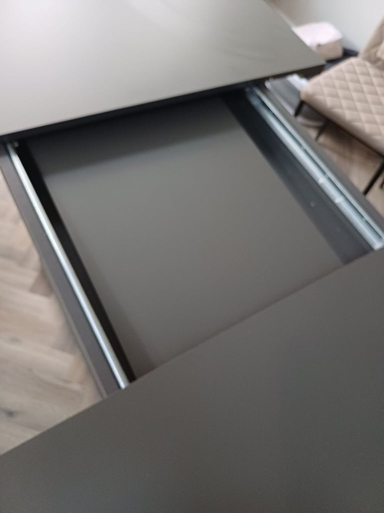 Grey extending dining table