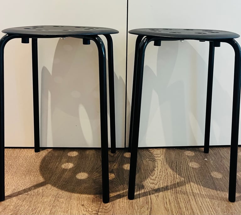 2 black dining stools