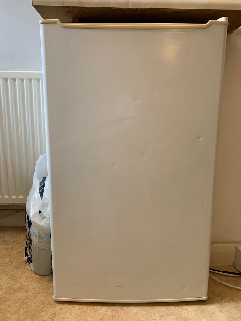 Small fridge with freezer compartment