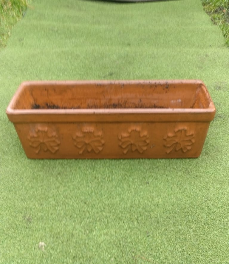 Beautifully weathered, vintage terracotta trough plante