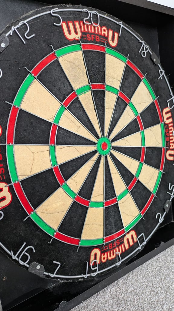 Vintage 1980's Winmau dartboard and Wooden cabinet with 3 sets of darts