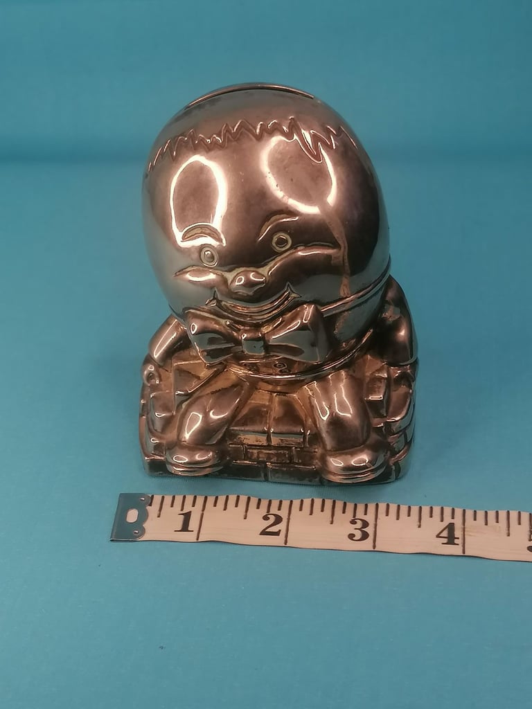 Vintage Humpty Dumpty Silver Plated Metal Coin Bank Money Box.. Missing one part.