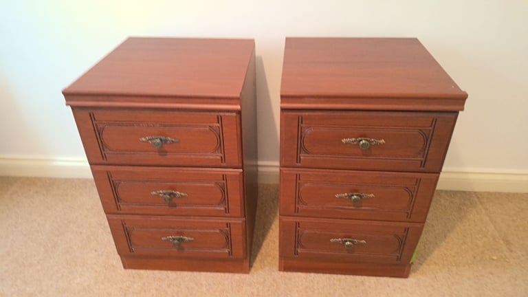 A matching pair of bedside cabinets with 3 drawers in each