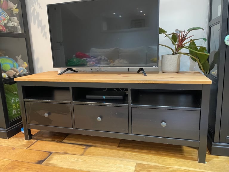 image for IKEA TV table, black and natural wood, with tree drawers