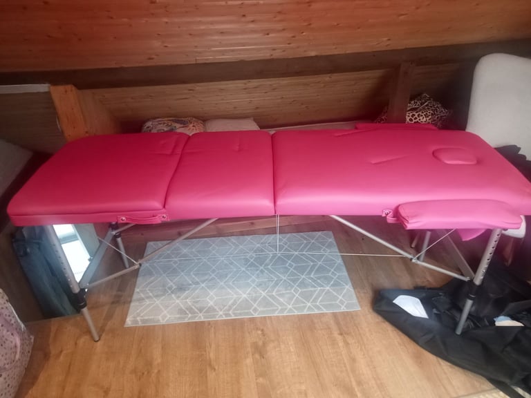 Pink massage table