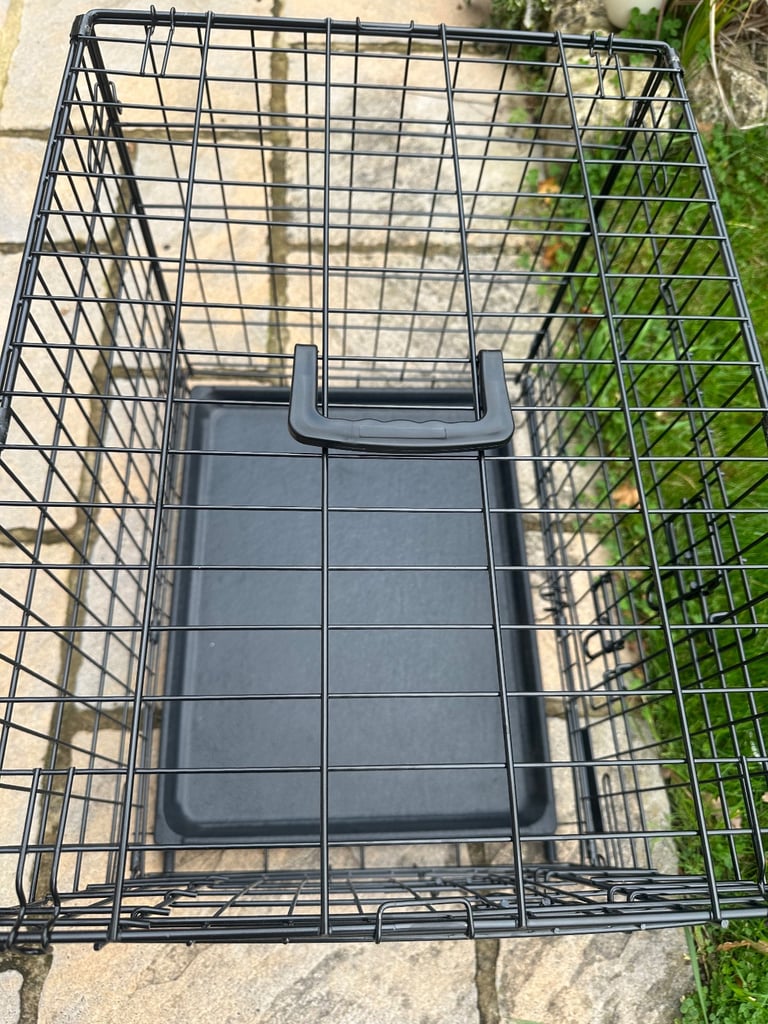 Lovely black dog crate for small/toy dog.