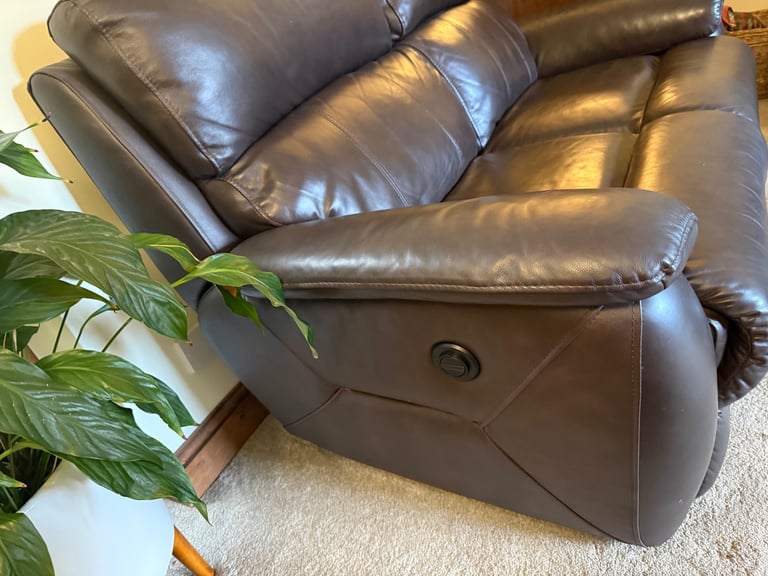 Leather two seater reclining sofa