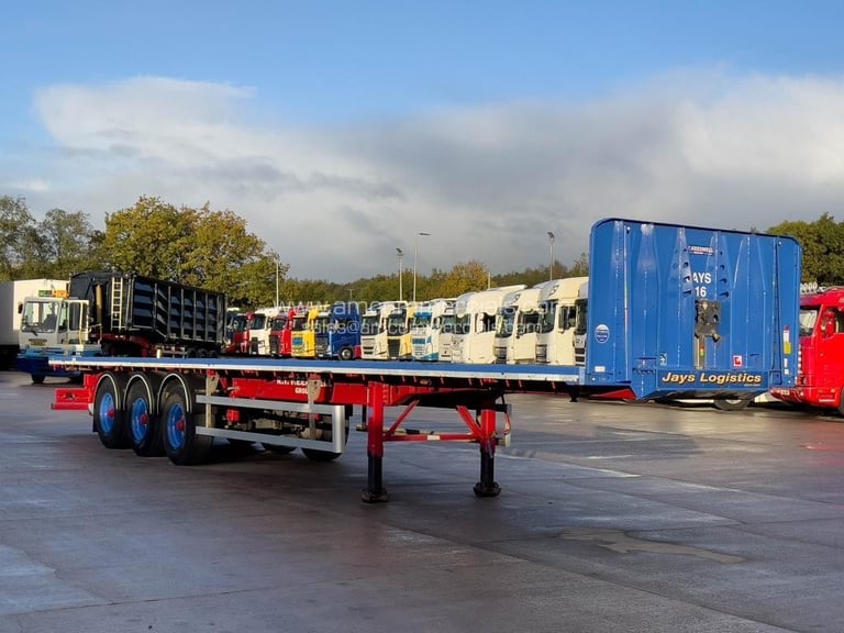 SDC TRI AXLE FLAT BED TRAILER 