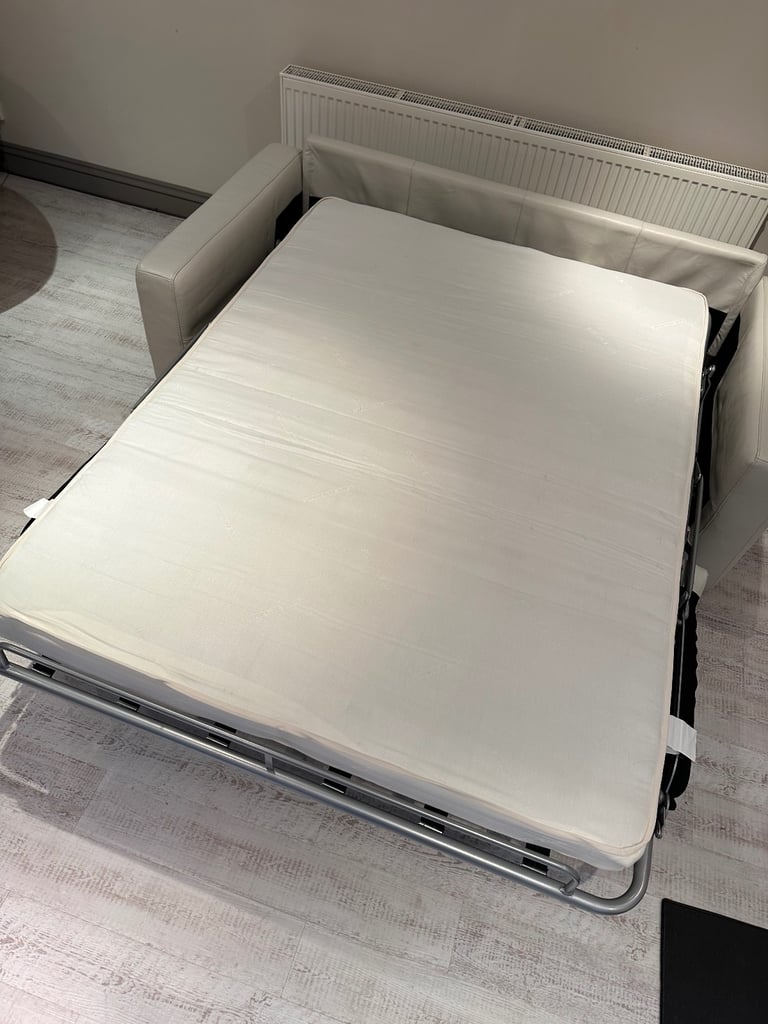 Natuzzi (Brand) cream leather sofa bed 