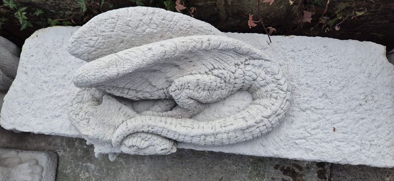 Mythical resting concrete dragon garden ornament statue