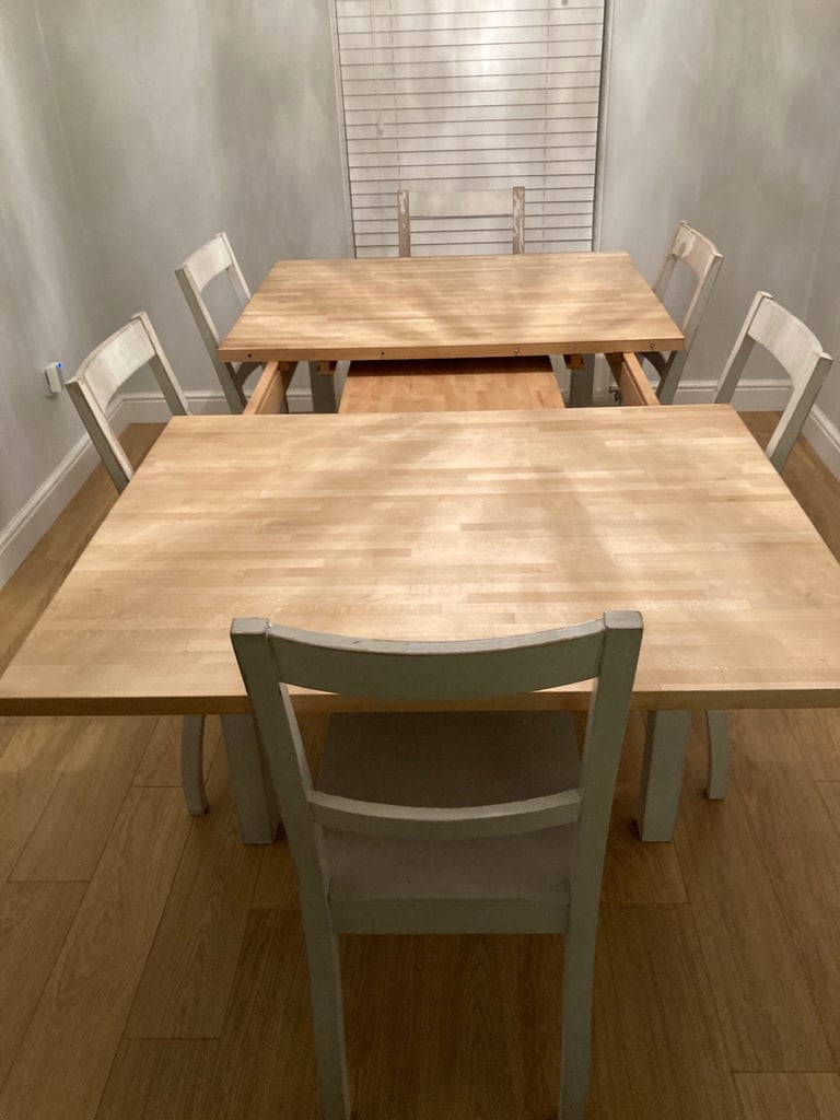 IKEA extendable solid wood dining table with 6 chairs 