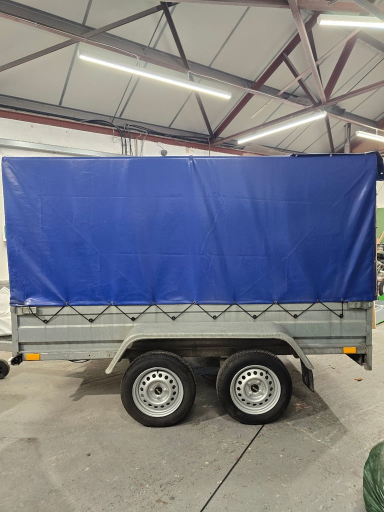 Unbraked 8.7ft by 4.2ft Trailer w/ ramp.