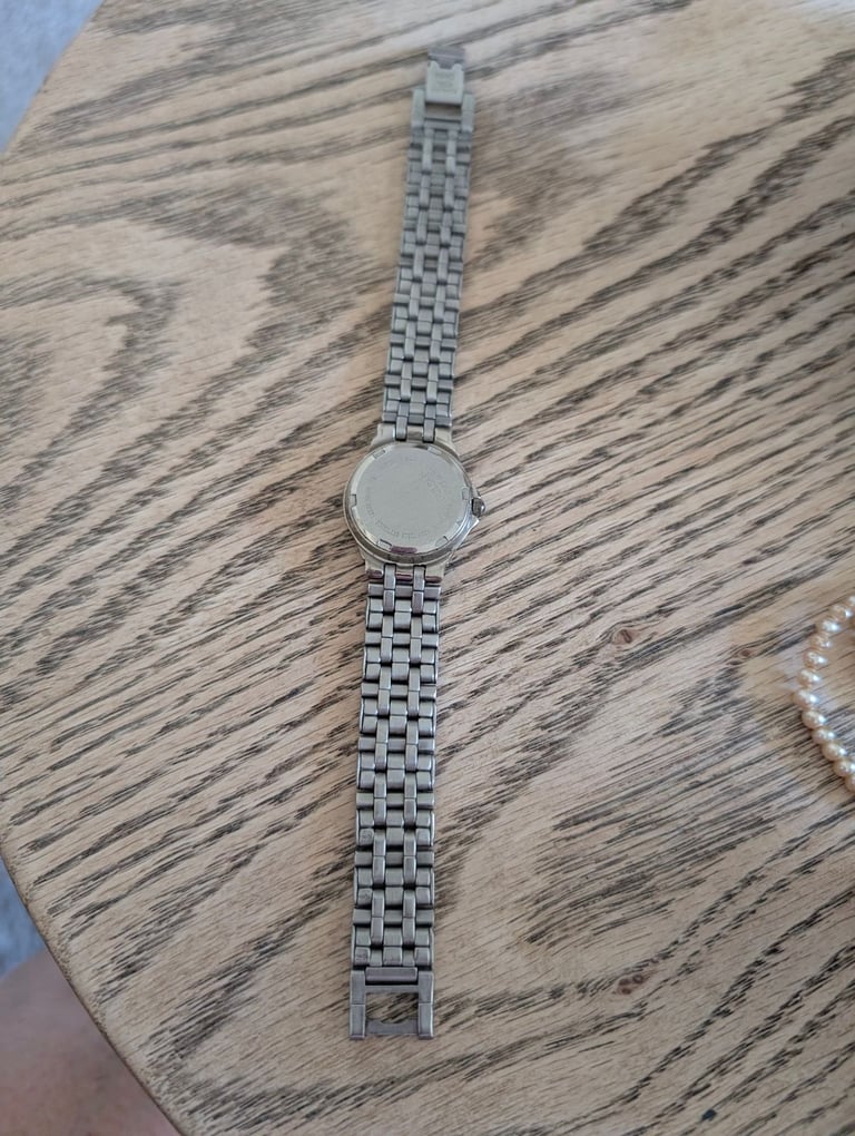 Ladies Pink Faced Pulsar Watch with Calender.