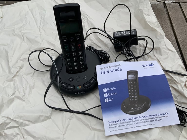 BT Cordless landline telephone with integrated answer machine.