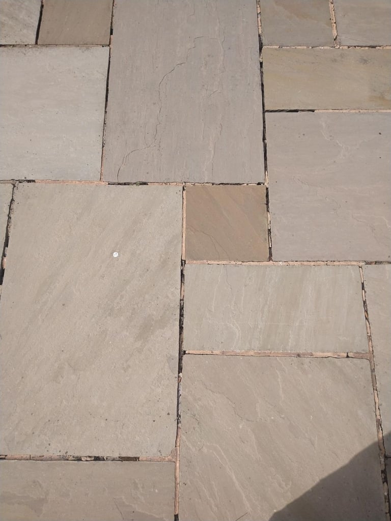 image for Used and layed natural riven Raj Green paving slabs to be lifted and taken away