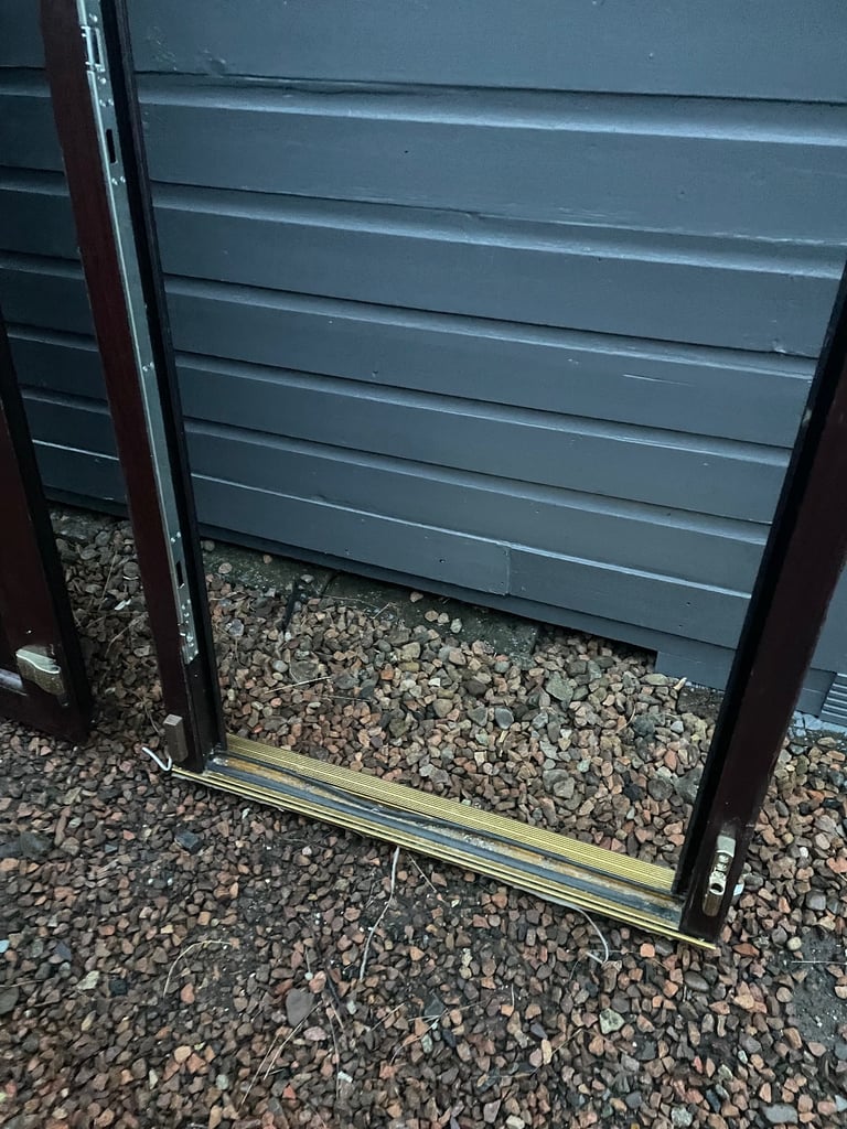 Upvc front door in rosewood 