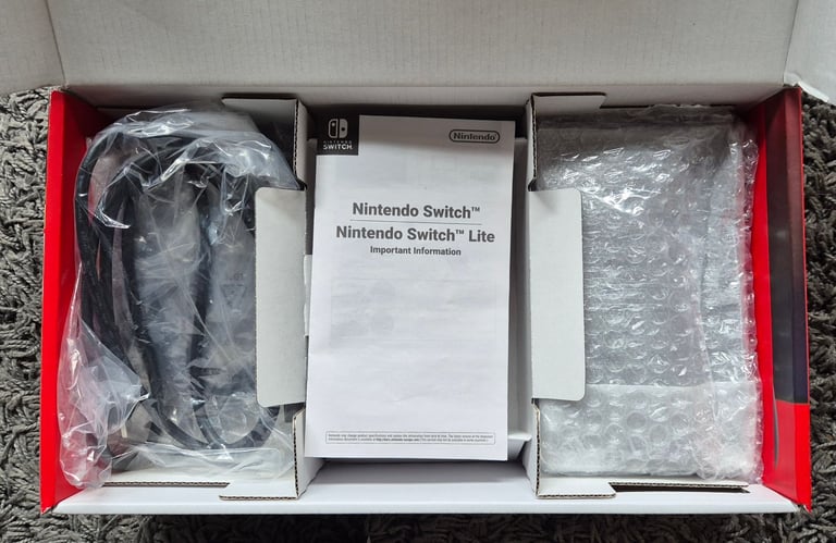 Nintendo Switch Grey with extra controller and 10 games.