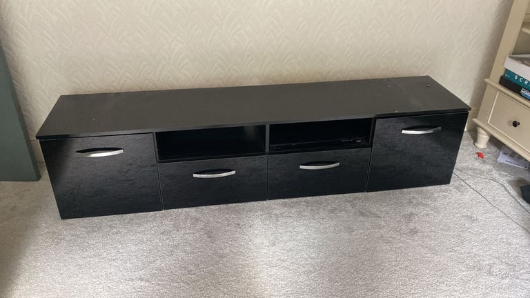 image for Like new tv stand 75inch tv 