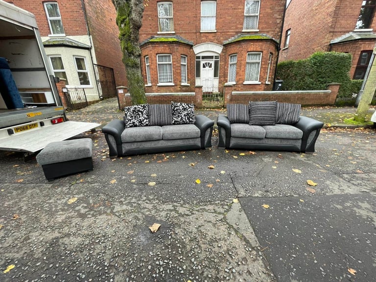 3 and 2 seater sofa in a black land grey fabric and leather couple of wee marks only £245