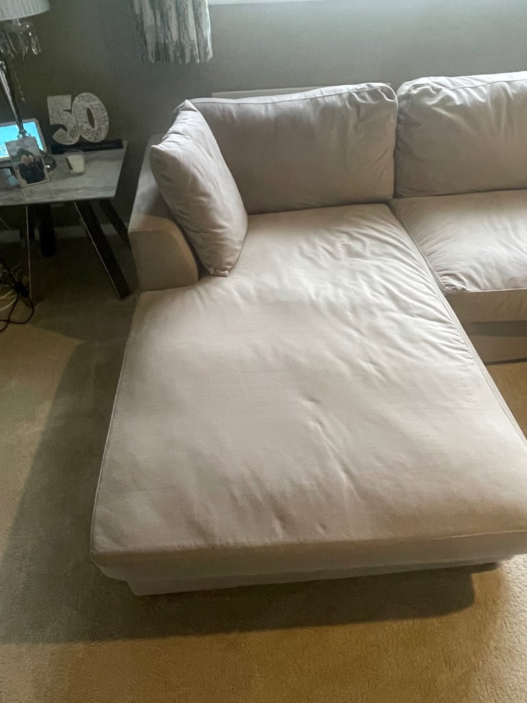 Under a year old sofa with chaise lounge