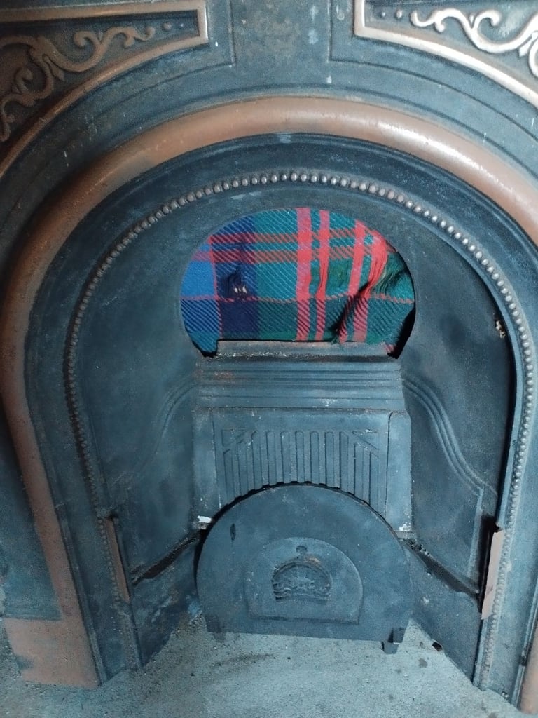 Cast Iron Fireplace with stone hearth 