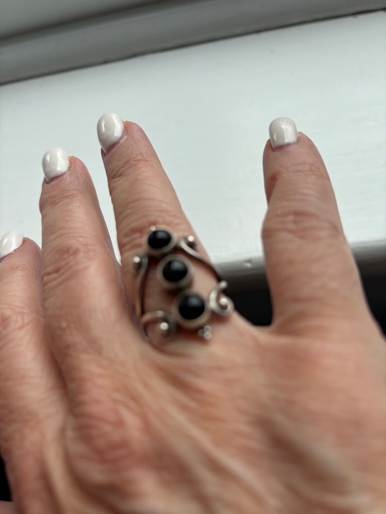 Silver plated ring with black onyx stones