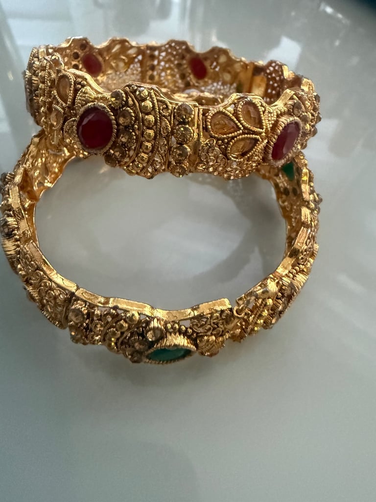 image for Pair of gold plated bangles 