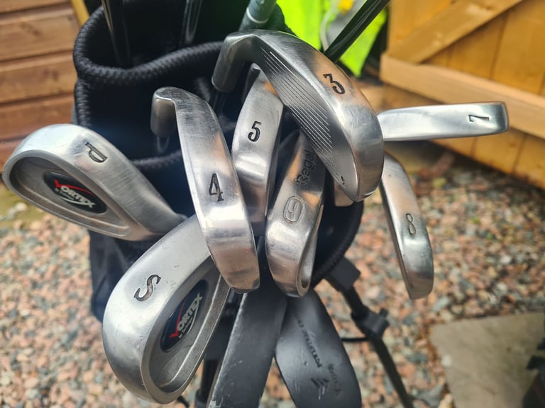 Full set of golf clubs.